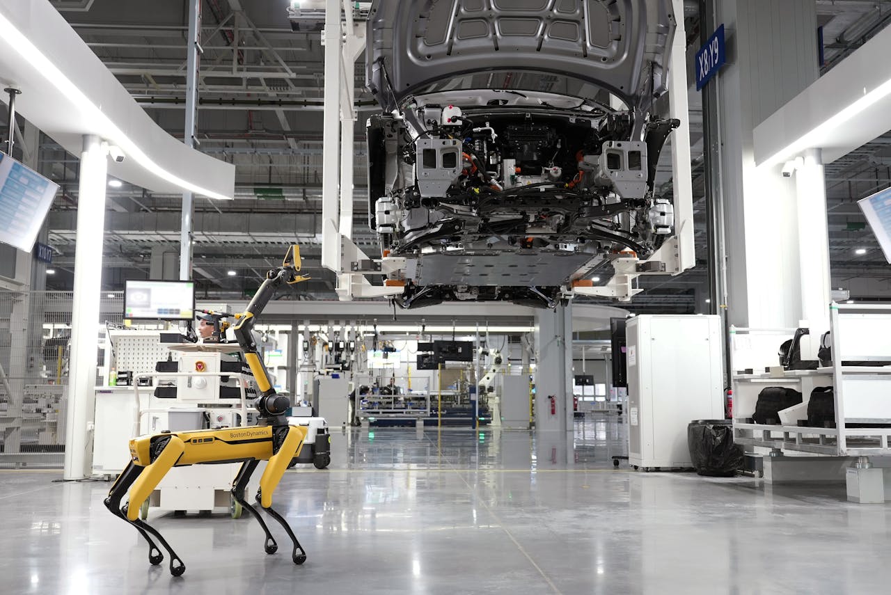 Ai robotic dog in a car manufacturing plant