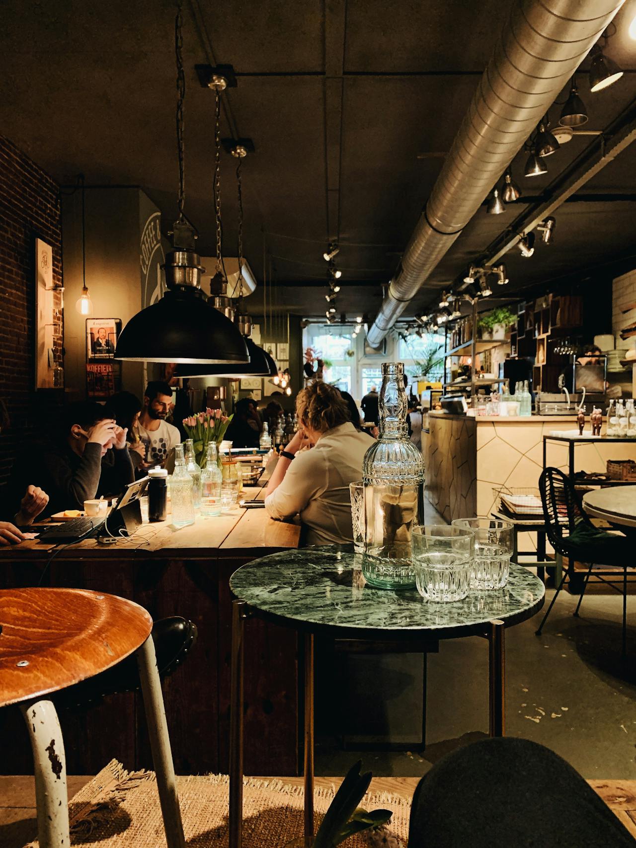 Group of friends having a drink at a cafe.